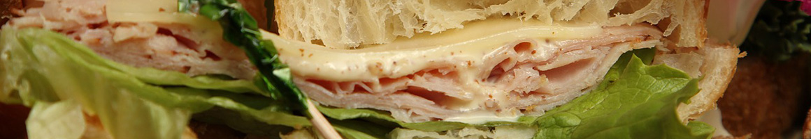Eating Deli Sandwich Cafe at Halletts Market & Cafe, restaurant in Spokane Valley, WA.